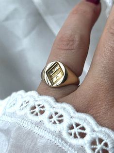 Finely detailed Antique French 18k Gold Signet Ring engraved with a family crest heraldic geometric motif. It is hallmarked with a French Eagle's Head Hallmark Indicating a Minimum Fineness of 18k Gold. The face of the ring measures 10 by 10 mm.  The ring is in very good condition and was lightly cleaned and polished. Weight: 4.86 grams Ring size: US 5 (resizable upon request) Good antique conditions. Thank you for visiting Boudoir Vintage!   Please feel free to contact me for further information or photos.  I offer international shipping. Your item will be packed with extreme care and will be shipped within 3-5 working days. If you are dissatisfied with your item, please feel free to contact me and would be happy to assist.  If you are interested in paying in installments or reserve an it Classic White Gold Signet Ring For Ceremonial Occasions, Luxury Yellow Gold Signet Ring With Coat Of Arms, Formal Gold Signet Ring With Coat Of Arms, Luxury Yellow Gold Coat Of Arms Signet Ring, Formal Yellow Gold Engraved Ring With Coat Of Arms, Luxury Gold Engraved Ring, Luxury Signet Ring For Anniversary, Luxury Polished Initial Open Ring, Luxury Initial Open Ring With Polished Finish