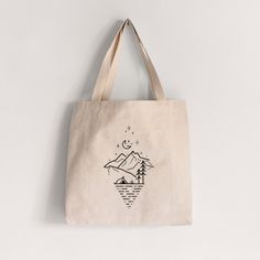 A stylish and trendy alternative to the old brown paper bag, this Camp Diamond tote bag will have other shoppers in line asking you where you got it! KEY FEATURES: - 12 ounce 100% cotton canvas-Approx 19.5"w x 15"h x 5"d- 26" long handles- square gusset bottom- reinforced stitching- hand-drawn Camp Diamond design HAND WASH ONLY and air dry. Machine wash and dry will cause shrinkage. Please allow for slight variations in color and image placement/size. Everyday Beige Canvas Bag With Eco-friendly Ink, Beige Eco-friendly Tote Canvas Bag, Natural Canvas Bag With Eco-friendly Ink, Brown Paper Bag, Brown Paper, Diamond Design, Art Clothes, Long Handles, Got It