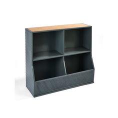 an empty shelf with four compartments on it