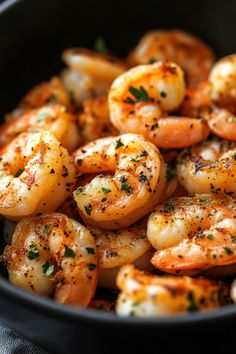 Grilled shrimp seasoned with herbs in a black bowl. Shrimp Air Fryer Recipes, Frozen Shrimp In Air Fryer, Healthy Air Fryer Shrimp, Shrimp From Frozen, Linguine Recipes Easy, Air Fryer Frozen Shrimp, Shrimp In Air Fryer, Shrimp And Veggies, Frozen Shrimp Recipes