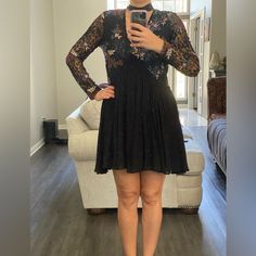 This Beautiful Lace Embroider Dress With Flowers On The Lace Part Is Flattering For Any Body Style. It Had A Beautiful Opening In The Back And It’s Very Light And Flowing. I’m 5’9” And 175lbs, Size 10, And The Dress Fits Me Perfectly. I Just Need Something A Little Longer. Smoke Free Home! New With Tags! V-neck Mini Dress With Lace Sleeves For Party, V-neck Mini Dress With Lace Sleeves For Night Out, Flowy Evening Dresses With Lace Sleeves, Floral Print Fit And Flare Mini Dress For Evening, Evening Floral Print Fit And Flare Mini Dress, Evening Fit And Flare Floral Print Mini Dress, Evening Fit And Flare Mini Dress With Floral Print, V-neck Dress With Lace Sleeves For Night Out, Flowy Mini Dress For Fall Evening