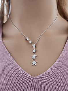 925 Sterling Silver Cubic Zirconia Stars Lariat Necklace Real 925 Sterling Silver NOT SILVER PLATED High Quality Silver Pendant  High polished rhodium finish gives this pendant a stunning shiny look that lasts many years. We have hundreds Silver Jewelry in stock. If you don't see what you are looking , feel free to ask us. Trendy, dainty, luxurious, classic with modern touch, elegant and fancy, fine quality made  925 Sterling Silver cubic zirconia multi stars necklace Descriptions 925 Sterling S Silver Star-shaped Jewelry With Adjustable Chain, Sterling Silver Star-shaped Clavicle Chain, Sterling Silver Star Clavicle Chain, Sterling Silver Star-shaped Jewelry With Adjustable Chain, Sterling Silver Star Jewelry With Adjustable Chain, Elegant Silver Star Charm Necklaces, Elegant Silver Necklace With Star Charm, Star-shaped Clavicle Chain Charm Necklace, Star Clavicle Chain Charm Necklace