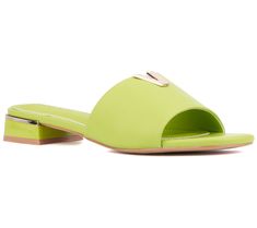 Step into the season with flair in this fashion-forward flat sandal that catches the eye with gleaming metallic V hardware, adding a touch of elegance to your spring and summer ensembles. From Torgeis. Elegant Green Flats For Summer, Open Toe Slides For Spring Parties, Chic Evening Flats For Summer, Spring Evening Slides, Chic Summer Evening Flats, Chic Evening Summer Flats, Party Slide Sandals For Spring, Spring Party Slide Sandals, Elegant Flat Heel Slides For Spring