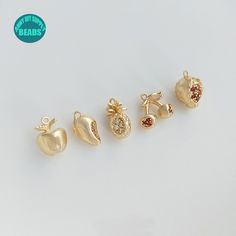 ❥Material: Base metal: Brass Real 14K Gold plated Brass,with Color protecting Layer. ➤Lead safe, nickel safe ❥Kindly Note:Not easy to get tarnished under proper care. ❥Size: #01 Apple:7.5x10.5mm #02 Mango:6.5x11mm #03 Cherry:about 10x11mm #04 pineapple:6.3x12mm #05 strawberry:8.3x11.5 ❥ Shipping ➤We ship from China. ➤Usually It will take 2-3 Weeks to US ➤Usually It will take 2-4 Weeks to other countries Gold Jewelry With Dangling Round Beads Charms, Gold Jewelry With Dangling Round Beads, Gold Birthstone Jewelry For Jewelry Making, Yellow Gold Brass Charms For Jewelry Making, Gold Round Charms For Jewelry Making, Handmade Gold Charms For Jewelry Making, Gold Jewelry With Dangling Charms For Anniversary, Gold Nickel-free Dangle Charms, Handmade Gold Round Charms