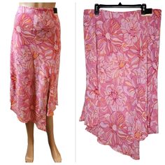 Lane Bryant Pink/Orange Floral Handkerchief Hem Midi Skirt. New With Tags Women's Plus Size 18/20. 2x Waist Flat Across Stretches From 18"-25" Lined 4 Slits 100% Polyester Displayed On My Xs 5'8" Mannequin Pink Barbie Barbiecore Plus Size Modest Church Dress Up Summer Flowy Stretch 3852 7.4oz Pink Stretch Long Skirt, Pink Asymmetrical Skirt With Floral Print, Asymmetrical Pink Skirt With Floral Print, Spring Stretch Maxi Skirt With Asymmetrical Design, Spring Stretch Asymmetrical Maxi Skirt, Flared Pink Maxi Skirt With Floral Print, Pink Flared Maxi Skirt With Floral Print, Pink Flared Maxi Skirt For Spring, Pink Maxi Skirt For Spring