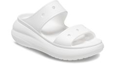 For a fresh new take on your favorite sandal, look to the Classic Crush Sandal. Featuring added height and a bold design, this dynamic new sandal features the popular and versatile two-strap design, plus Jibbitz™ holes on the sandal straps for personalization. The Crocs comfort you love, plus an extra dose of height, attitude, and style.  Crush Sandal Details:    Stylish two strap design  Unique 2-inch / 5.2cm height, measured from floor to heel rest  Customizable with Jibbitz™ charms  Iconic Cr Trendy Synthetic Double Strap Slides, Trendy Double Strap Synthetic Slides, Synthetic Double Strap Platform Slides, Casual Double Strap Slides With Arch Support, White Synthetic Double Strap Footbed Sandals, White Double Strap Footbed Sandals, Casual Double Strap Synthetic Slides, White Slide Sport Sandals With Arch Support, White Double Strap Platform Sandals