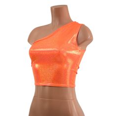 "Four way stretch sparkly orange spandex, in a one shoulder design. This top is holographic, dazzling in the sunlight, and UV glow under blacklight! This item is made to order. Ships out within 5 days of purchase. Womens Sizing (See below for instructions on where measurements should be taken) XXS: Bust 29\"-30\" / Waist 22\"-23\" / Hips 30\"-32\" Extra Small: Bust 31\"-32\" / Waist 24\"-25\" / Hips 33\"-35\" Small: Bust 33\"-34\" / Waist 26\"-28\" / Hips 36\"-37\" Medium: Bust 35\"-37\" /Waist Sleeveless Turtleneck Outfit, Winx Cosplay, Magical Girl Outfit, Glitter Shorts, One Shoulder Crop Top, Turtleneck Outfit, Orange Fits, Leather Crop Top, Sparkly Top