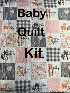 the baby quilt kit has animals on it