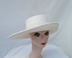 This unique shape wide brimmed wool felt hat would be perfect for any special occasion. The hat is trimmed with an ivory grosgrain ribbon band that is removable if you would like to use another band. The shape of this hat is inspired by the actor Billy Porter. The hat will fit up to a 22 5/8 inch head size. Stylish Womens Hats, Billy Porter, Classy Hats, Birthday Fits, Festival Hat, African Head Wraps, Elegant Hats, Unique Hats, Hat Ideas