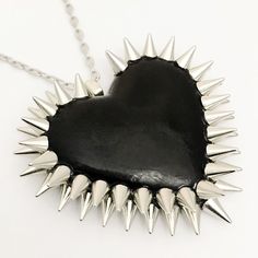 The Double Row Spiked Heart is a Bunny Paige classic. Dozens of spikes are individually hand-applied to give each heart its iconic double row halo. Spiked Heart Pendant: 2.5" wide 16" silver plated or gunmetal chain + 2" extender 100% handmade All jewelry comes beautifully gift wrapped Professional Jewelry, A Bunny, Jewelry Outfit, The Double, Gothic Jewelry, Silver Pieces, Keep Jewelry, Cleaning Jewelry, Heart Charm