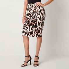 This Bold Elements women's leopard-print midi skirt is a sleek contemporary style to elevate your work or evening wear. Made from a soft stretch-scuba, this pencil skirt has an elastic pull-on waist and fitted silhouette. Wear it with a blouse or turtleneck. Front Style: Flat FrontClosure Type: Full ElasticRise: At WaistApparel Length: 26.5 InchesFiber Content: 97% Polyester, 3% SpandexFabric Description: ScubaLining: UnlinedSkirt Length: Midi LengthCare: Tumble Dry, Machine WashSkirt Type: Penc Fitted Elegant Leopard Print Bottoms, Elegant Fitted Leopard Print Bottoms, Chic Lined Leopard Print Skirt, Chic Leopard Print Lined Skirt, Chic Leopard Print Skirt, Trendy Fitted Leopard Print Skirt, Chic Leopard Print Midi Skirt, Elegant Leopard Print Summer Bottoms, Trendy High Waist Leopard Print Skirt