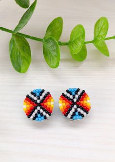 "Turquoise colorful beadwork stud earrings in Native style. Traditional American earrings for men & women. The earrings are handmade from Japanese beads Toho, using felt, a strong synthetic thread, a clasp of hypoallergenic metal, and leather. Measurements: Diameter of the earrings ≈ 0.75\" It will be a great gift, I send all jewelry in gift wrapping. You can also order earrings in the colors you like! Similar earrings are available in other colors. https://www.etsy.com/listing/1304430356/turquo Adjustable Multicolor Earrings With Spacer Beads, Bohemian Multicolor Clip-on Earrings As A Gift, Bohemian Multicolor Clip-on Earrings For Gift, Southwestern Multicolor Round Bead Earrings, Southwestern Style Multicolor Tiny Beads Earrings, Southwestern Multicolor Round Earrings, Handmade Multicolor Bohemian Clip-on Earrings, Southwestern Style Earrings With Tiny Beads For Gift, Traditional Multicolor Earrings With Spacer Beads