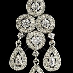 CZ%20Chandelier%20Earrings%0D%0AAdd%20a%20glamorous%20touch%20to%20your%20bridal%20or%20prom%20look%20with%20these%20dazzling%20cz%20crystal%20chandelier%20earrings.%20These%20stunning%20earrings%20feature%20teardrop%20and%20round%20cz%20crystals%20in%20a%20beautiful%20rhodium%20plated%20design.%0D%0AThese%20earrings%20are%20a%20great%20choice%20for%20your%20wedding%2C%20quinceanera%20or%20any%20special%20occasion%20in%20need%20of%20some%20extra%20sparkle!Size%3A%202%22%20long%20and%203%2F4%22%20wide.%0D%0AColor%3A%20Silver.%0D%0AStyle%3A%20E7612.%0D%0AA%20beautiful%20accessory%20for%20the%20bride%20or%20her%20bridesmaids.%0D%0ADo%20you%20need%20several%20pair%20of%20earrings%20for%20your%20bridal%20party%20or%20damas%3F%20You%20can%20buy%20in%20bulk%20and%20save!%0D%0APlease%20allow%201%2 Chandelier Wedding, Wedding Earrings Chandelier, Prom Look, Jewelry Gift Guide, Wedding Chandelier, Crystal Chandelier Earrings, Bridal Fashion Jewelry, Stunning Earrings, Exquisite Jewelry