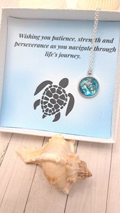 Keep calm and love Sea Turtles - This Sea Turtle Charm Necklace features a cool turtle charm and sterling silver chain and a message gift box. This turtle necklace is the perfect gift for anyone who loves the sea or the beach. The turtle charm is made of high-quality silver. This makes an excellent gift for yourself or your friends and family members who love to collect turtles, ocean life, or beach-themed jewelry. This exquisite 18" snake chain necklace comes with a turtle charm and a white gif Ocean-inspired Adjustable Necklace As A Gift, Adjustable Ocean-inspired Necklace For Gifts, Adjustable Ocean-inspired Necklace For Gift, Ocean-inspired Pendant Charm Necklace As Gift, Ocean-inspired Jewelry With Round Pendant For Gift, Ocean-inspired Round Pendant Jewelry For Gift, Ocean-inspired Round Pendant Jewelry Gift, Inspirational Blue Jewelry For Gifts, Inspirational Blue Jewelry As A Gift