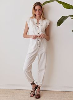 Instant Outfit. Where utility gets a stylish upgrade. Whether you're brunching with friends or exploring the city, this jumpsuit has you covered. With snap details and a rope drawcord, it exudes laid-back charm with a touch of urban flair. Casual Cargo Jumpsuits And Rompers For Work, Summer Casual Cargo Jumpsuits And Rompers, Summer Cargo Style Jumpsuits And Rompers, Casual Summer Cargo Jumpsuits And Rompers, Tee Shop, Best Sellers, The City, Casual Wear, Spa