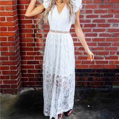 Beautiful Lace Maxi Dress. Has Cute Lace Cutouts Along The Waistline. Perfect Dress For That Special Occasion Or Anything Bridal! Size Large Zipper Back No Stretch Elegant Lace Maxi Dress For Summer, Lace V-neck Maxi Dress For Summer, Chic Flowy Lace Maxi Dress, Elegant Lace Midi Dress For Vacation, Fitted Lace Maxi Dress For Vacation, Feminine White Lace Maxi Dress, Flowy Lace Dress For Party, White Lace Feminine Maxi Dress, Summer Lace Maxi Dress With Short Sleeves