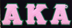 the letters are pink and green in color