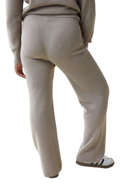 Move through your pregnancy in ultimate comfort as you lounge or run errands in these ribbed pants that bring the softness of a sweater and the polish of straight-leg pants. 28" inseam Pull-on style Over-the-bump waistband 50% polyester, 50% acrylic Machine wash, dry flat Imported Full Length Ribbed Athleisure Pants, Ribbed Full-length Athleisure Pants, Comfy Ribbed Bottoms, Fall Loungewear Bottoms, Fitted Ribbed Comfortable Bottoms, Comfortable Fitted Ribbed Bottoms, Ribbed Lounging Pants, Cozy Full Length Bottoms With Ribbed Waistband, Comfortable Ribbed Loungewear Bottoms