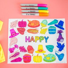 a card that says happy surrounded by crayons and markers on a pink background