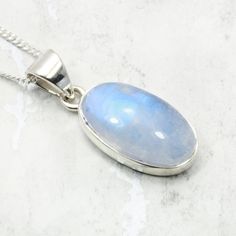 This Blue Moonstone & Silver Pendant would make a great gift for someone special. It is incredibly striking, the rear of the gemstone is encased in silver and backed to produce a fantastic, bright blue colour. Moonstone is regarded as a guardian of women and the environment. In line with its feminine character, it is said to inspire flexibility, nurture its users through difficult times and balance the mind and body. With its fantastic energy and luminous appearance set in 925 Sterling Silver, t Gemstone Chips Bracelet, Bismuth Crystal, Blue Moonstone, Pink Agate, Difficult Times, Watermelon Tourmaline, Agate Crystal, Tourmaline Gemstone, Crystal Sphere