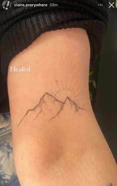 the back of a woman's leg with a tattoo on it that reads healed