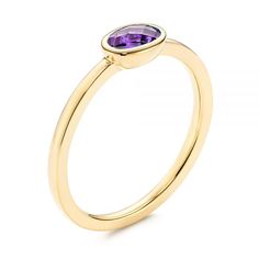 106631 14k Yellow Gold Ring   Amethyst - .50 ctw. This dainty fashion ring is the perfect match with any casual outfit. It is designed to be either worn alone, stacked across the hand with similar designs or layered on one finger. Many versions of this ring are available, from white gold and rose gold, to an assortment of aquamarine, London blue topaz and various colorful gemstones. You can start designing your own ring based on your preferences. Design Your Own Ring         Oval Amethyst in Bez Stackable Ruby Ring For Formal Occasions, 14k Gold Amethyst Solitaire Ring, Formal Stackable Rings With Smooth Bezel, Elegant Stackable Amethyst Ring, Stackable Amethyst Promise Ring, Elegant Oval Amethyst Stackable Ring, 14k Gold Solitaire Sapphire Ring, Yellow Gold Amethyst Ring With Bezel Setting For Promise, Dainty Ruby Ring With Bezel Setting