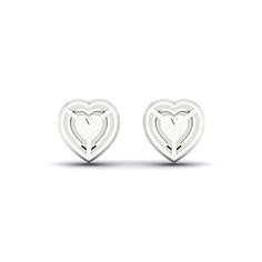 A captivating heart-cut diamond is delicately cradled in a secure prong setting in these Heart Halo Studs. Surrounding this charming centerpiece is a stunning halo of round diamonds, meticulously set in a micropavé configuration. Whether you're wearing them to a formal gala, a romantic dinner, or simply to elevate your everyday look, these diamond stud earrings are a symbol of grace and refinement. Heart Halo, Grace Symbol, Romantic Dinner, Diamond Stud Earrings, Romantic Dinners, Diamond Stud, Center Stage, Micro Pave, Tennis Bracelet