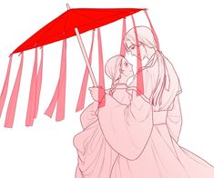 two people standing under an umbrella with red ribbons hanging from it's sides and one person holding the other