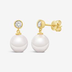 Add a touch of sheer elegance with our pearl drop earrings. The bezel-set round brilliant-cut diamond solitaire will catch the eye, while the pearl drop adds a classic touch. Handcrafted in 14K yellow or white gold, they are perfect for any occasion. Natural Freshwater Pearls: 8.5-9mm Natural Diamonds: 0.25ctw 14K Yellow or White Gold Length: 1/2 Inch The Pearl, Bezel Diamond, Pearl Drop Earrings, Pearl Drop, Round Brilliant Cut Diamond, Diamond Solitaire, Bezel Setting, The Eye, Round Brilliant