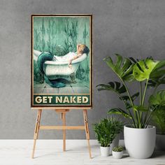 a poster with a mermaid taking a bath in a tub that says get naked on it