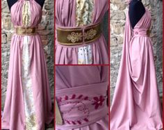 the dress is pink and has gold trim