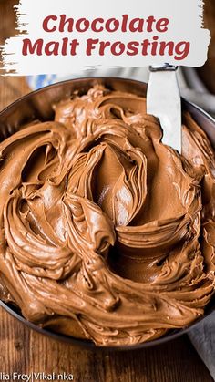 chocolate frosting in a metal bowl with a spatula on top and text overlay that reads best melted milk chocolate frosting