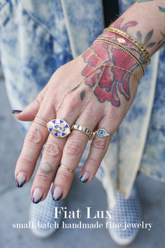 Evil Eyes and Third Eyes on my vision board for more healing meditation and clarity in the new year. Wearing Harwell Godfrey's Tanzanite & Lapis Lazuli Cleopatra Eye Cocktail Ring & Rainbow Sapphire Baguette Pyramid Ring with Eyeba's prosthetic eyeball pinky ring. Paired with a solid gold permanent jewelry hand chain, Amali Woven Textile Row Diamond Bracelet, diamond evil eye Wrist Mati bracelet, and the Harwell Godfrey Knife Edge Rainbw Talisman Bangle on a flower tattooed hand. Harwell Godfrey, Power Rings, Pyramid Ring, My Vision Board, Rings Dainty, Permanent Jewelry, Dainty Diamond Necklace, Rainbow Sapphires