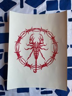 a red and white drawing of a scorpion