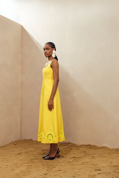 Elevate your summer style with our Kwara Dress. Hand-crafted by artists in Nigeria, this sundress features stunning crochet details along the hem. With a square neck and sleeveless design, this 100% cotton dress is perfect for your next weekend getaway. Stay cool and stylish with this must-have piece with pockets. Dry clean only Size up if in between sizes Colour may vary due to lighting on images Summer Dresses With Lace Trim And Straight Neckline, Beach Midi Dress With Straight Neckline, Summer Midi Dress With Cutwork Hem, Summer Maxi Dress With Lace Trim And Square Neck, Bohemian Cotton Dress With Cutwork Hem, Cotton Midi Dress With Lace Trim For Vacation, Midi Length Dresses With Cutwork Hem For Vacation, Summer Sundress With Crochet Trim, Spring Crochet Dress With Square Neck