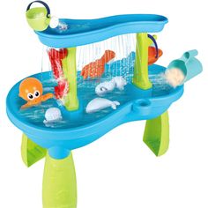 an inflatable water table with various toys on it