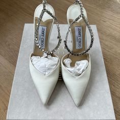 Jimmy Choo Saeda In Ivory/Crystal Perfect For Any Wedding/Rehearsal Celebration Size 7/37 Never Worn; Tried On Inside Home Only No Defects Bought Directly From Jimmy Choo Retailing For $1200 Receipt Pictured And Available Made In Italy Wedding, Rehearsal, Ceremony, Shoes, Bridal, Bride Wedding Shoes Bride Writing, Mr And Mrs Shoes Wedding Photo, Bridal Handbags Jimmy Choo, Jimmy Chu Wedding Shoes, Jimmy Choo Bridal Shoes Sparkle, Jimmy Choo Wedding Shoes Flats, Jimmy Choo Saeda, Lilac Heels, Jimmy Choo Wedding Shoes