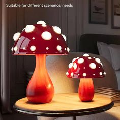 two red lamps sitting on top of a table