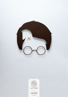 a paper cut out of harry potter with glasses on it's head and hair