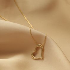 Ⓜ14 K Gold Heart Necklace Frame Pendant Valentine's Day New's Years Gift For Women ⓂThe heart has always been a symbol of unconditional love . The power of the heart is unlimited in religious teachings . Because the heart is home of God, and it is our reality gateway to the universe. Heart necklace is one of the most stylish and meaningful necklaces that will represent your love. It is an excellent option for special occasions as a birthday present, a Valentine's gift or a gift for Mother's Day. Double Heart Tarnish Resistant Necklace For Mother's Day, Tarnish Resistant Open Heart Necklace As Gift, Tarnish Resistant Heart Cut Necklace For Gift, Tarnish Resistant Heart Cut Heart Necklace For Gift, Heart-shaped Tarnish Resistant Necklace For Valentine's Day, Minimalist Open Heart Tarnish Resistant Necklace, Valentine's Day Heart Necklace, Tarnish Resistant, Valentine's Day Tarnish Resistant Heart Necklaces, Tarnish Resistant Heart Pendant Necklace For Mother's Day