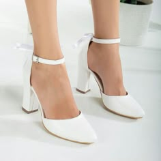 WHITE WEDDING SHOES - BRIDAL SHOES WITH BOW -  WEDDING HEELS Introducing the pinnacle of grace and comfort for your special day - the Wedding Heels with Ribbon from Belle Wedding Shoes. * With a refined closed toe front and a dainty satin ribbon in the back, these white wedding shoes effortlessly blend elegance with a hint of romance. The 4 inches (around 10 cm) white block heels add stature, bestowing upon you an aura of regal grace as you step into your moment. * Crafted for the contemporary b Wedding Shoes Simple Classy, White Block Heels Wedding, Wedding Shoes Bride Comfortable, Bridal Heels Comfortable, White Closed Toe Heels, Bride Shoes Wedding Heels, Wedding Shoes Bride Heels, White Bridal Heels, Classic Wedding Shoes