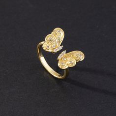 Fashion Element: Butterfly Style: Personality Gold Diamond Butterfly Ring Gift, Gold Butterfly Diamond Ring Gift, Gold Diamond Butterfly Ring As Gift, Elegant Gold Butterfly Ring With Diamond Accents, Elegant Open Butterfly Metal Ring, Elegant Open Butterfly Ring, Gold Diamond Butterfly Open Ring, Gold Diamond Butterfly Ring With Open Design, Gold Ring Design For Women