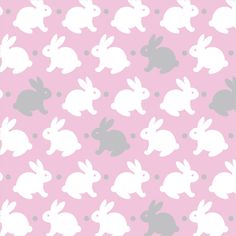 a pink background with white rabbits on it