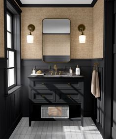 a bathroom with two sinks and a large mirror