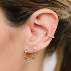 14k gold thick wire ear cuff with a prong set round white diamond that sits inside the ear SPECIFICS • cuff is approx. 13mm in diameter• round diamond is approx. 2mm• white diamonds .03 ctw 14k Gold Pierced Ear Cuff Fine Jewelry, 14k White Gold Single Ear Cuff, Single 14k White Gold Ear Cuff, Yellow Gold Ear Cuff With Prong Setting, 14k Gold Pierced Round Ear Cuff, Fine Jewelry Single Diamond Hoop, Fine Jewelry 14k Gold Cartilage Earrings With Prong Setting, Round Diamond Cartilage Earrings For Pierced Ears, Gold Round Ear Cuff Fine Jewelry