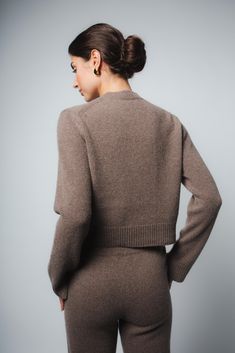 The Zoe cashmere sweater in Chestnut is made in Europe using a luxurious Italian eco-cashmere yarn. Featuring a relaxed cropped fit, French shoulders, and a slit cuff detail, this ultra-soft and timeless piece is the perfect staple in any wardrobe. Fit: Bianca, our model is 5.8” or 1.77 m tall and wears size 1. Made from a medium-weight knit, the sweater is approximately 18” (45cm) long. Content: 100% eco cashmere. Care instructions:- Wash inside out in warm water with cashmere or wool shampoo. Chic Wardrobe, Organic Cleaning Products, Cashmere Yarn, Family Album, Cuff Detail, Cashmere Sweater, Scandinavian Style, Cashmere Sweaters, Chestnut