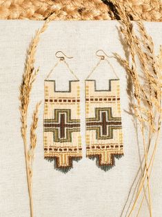 Experience the allure of a picturesque Southwest sunset with the Isla Beaded Earrings. Carefully handwoven using Delica seed beads, these earrings feature an intricate blend of warm terracotta, sandy beige, and golden hues reminiscent of adobe clay walls basked in the setting sun. With a perfect balance of elegance and rustic charm, these earrings add a touch of Southwestern elegance to any ensemble, making them an ideal choice for those seeking unique and artisanal jewelry. Handmade beaded earr Delica Seed Bead Earrings, Artisan Multicolor Beaded Earrings With Gold Beads, Brown Woven Bohemian Jewelry, Bohemian Brown Woven Jewelry, Brown Handwoven Round Bead Jewelry, Beach Beaded Earrings With Colorful Beads, Natural Color Beaded Dangle Jewelry, Colorful Beaded Brown Earrings For Beach, Natural Beaded Dangle Jewelry