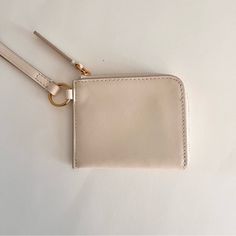 The Essential Small Zip Wallet In Leather Item Np325 New, Never Used Ecru Color Gold Hardware Sold Out Online Highly Rated Beige Leather Coin Purse With Coin Pocket, Leather Beige Coin Purse, Chic Wallets With Coin Pocket For Everyday Use, Everyday Beige Bag With Coin Pocket, Beige Coin Purse With Interior Card Slots, Beige Coin Purse With Interior Card Slots For Everyday, Beige Travel Coin Purse With Coin Pocket, Modern Beige Wallets For Daily Use, Minimalist Wallets For Everyday Use