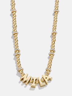 We all love a gold necklace, no matter the age! Our Kids' Custom Pisa Nameplate Necklace is for you. Gold letter beads in a block font are flanked by a gold pisa beads. The beads sit in between each letter, letting them all get their individual spotlight. Whether you pick a name, phrase or place, we're certain this is a piece you'll want to keep in your everyday stack. See our Letter Key for all options available. This necklace features 4mm beads. Please note: intended for children 3+. Nameplate Necklace Gold, Last Day To Order, Block Fonts, Block Font, Early Black Friday, Nameplate Necklace, Gold Letter, Letter Beads, Custom Gifts