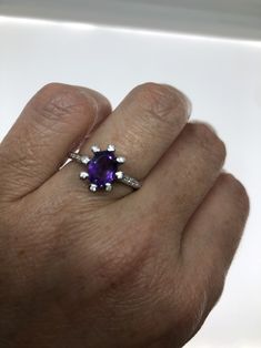 Unusual Deep Toned Amethyst Sterling Filigree Setting Accented with White Sapphires Handmade Size 6 Can be resized, my jeweler charges $10-$20 All rings are shipped in a nice gift box. Check out our over a THOUSAND great reviews Engraving is $4 per letter and is not always perfect depending on the piece. It can take a few days if the jeweler is busy. This is payable to Paypal Judithsltd@gmail.com Sterling Silver Purple Center Stone Gemstones, Sterling Silver Gemstones With Purple Center Stone, Lavender Amethyst Ring In Oval Sterling Silver, Lavender Amethyst Ring In Sterling Silver, Lavender Oval Amethyst Ring In Sterling Silver, Sterling Silver Amethyst Ring With Prong Setting As Gift, Sterling Silver Amethyst Ring With Accent Stones, Sterling Silver Amethyst Ring With Accent Stones As Gift, Gift Amethyst Ring With Accent Stones In Sterling Silver